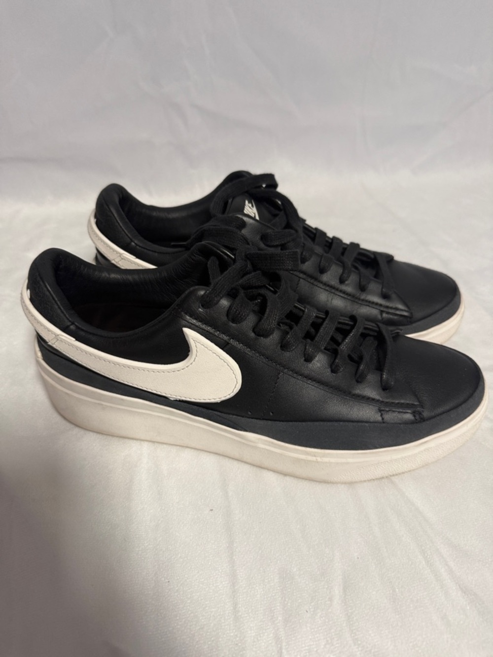 Nike Black Leather Sneakers with White Swoosh and Cream Platform